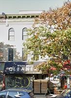 Mixed-use brick building located at 1406 Nostrand Avenue, Brooklyn, NY 11226. Classified as a 1â€“3 family residence with ground-floor commercial use, this property sits on Block 5088, Lot 43, in the heart of Flatbush.