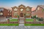 Welcome to this 2010 built, completely custom single-family home, nestled mid-block in a prime location within the school district #26. Boasting 5 spacious bedrooms, 4 full baths & 1 half bath, this home is designed for modern comfort and timeless elegance. The house is built with modern framing technique with 2X6 stud walls, filled with R-19 insulation in the exterior and R-30 insulation in-between the floor system. Step inside and be captivated by expansive Andersen 400 series bow & casement windows with wood finished interior, welcoming natural light that illuminates the space and enhances the warm, inviting atmosphere. The large family room features a cozy natural gas-burning fireplace, creating the perfect setting for relaxation and gatherings. Gleaming engineered wood and granite floors with 7 zones radiant heating underneath, lead you to the sleek chefâ€™s kitchen, showcasing granite countertops, stainless-steel GE Profile and Caf&#233; appliances, and a spacious, open layout ideal for entertaining. From the family room/dining room, step onto the walk-out raised-paver deck, where youâ€™ll overlook an expansive lush backyardâ€”a private oasis perfect for outdoor enjoyment. Thoughtful custom Hunter Douglas blinds throughout the home add elegance and privacy. Recent major upgrades ensure lasting quality and modern conveniences, including a state-of-the-art new Lennox & Guardian A/C condensers, with additional 2 zone Central Heating System. The house is pre-wired with central surround sound on the 1st floor and the rear yard for entertaining. All bathrooms are finished wall-ceiling with matching floor & ceiling tiles. The house comes equipped with ADT monitored security and CO/fire alarm system. Exterior enhancements elevate this homeâ€™s appeal, including a new completely owned 10 panel solar system, which has brought the electric bill down to Only $27/month! The system provides an annual rebate of $888.00 and is transferrable to the new owner. A beautiful brick with stainless steel railings fence at the front with Vinyl fence on the sides provides a fully private yard for your enjoyment. There is 12+ feet wide, paver driveway which ensures ample parking, and leads to separate entry to the basement. The basement is full finished with a separate utility room, meter room and a half bath. Situated in a private setting, yet conveniently close to shopping, outlet malls, schools, and major roadways, this home is perfect for a big familyâ€”offering the perfect blend of newer construction, comfort, and style.