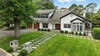 This stunning contemporary home, located in the award-winning Edgemont School District, offers nearly half an acre of professionally landscaped grounds with an in-ground pool. Tastefully renovated in 2022, this expansive residence boasts 7 bedrooms, 5 full baths, and 1 half bath across 5, 361 square feet of luxurious living space. This home is perfectly designed for modern living with oversized windows, high vaulted ceilings, and abundant natural light throughout.The first floor features a grand entry foyer leading to a spacious living room and a chefâ€™s dream kitchen, equipped with top-of-the-line stainless steel appliances, including a 48â€ Sub-Zero refrigerator, two Dacor wall ovens, a 6-burner Viking cooktop, and a large center island with breakfast bar seating, all complemented by black granite leathered finish countertops. The main level also includes a luxurious master suite with a huge walk-in closet, oversized glass shower with dual rain shower heads, and a romantic gas fireplace. An additional guest bedroom with ensuite bath, a home office, powder room and easy access to an attached two-car garage complete this level. Lovely views from a large rear deck provide the perfect ending to your day.The second floor starts with a sunny, open landing and offers three additional bedrooms, a full bath, and additional storage areas for future potential use. The home&rsquo;s lower level is the fun zone with expansive recreation areas, a mini bar with wine cooler, gym with full bath, laundry room, and additional storage. Walkout from this level accesses a large deck and patio, and is surrounded by professionally landscaped trees and mature plantings, lovely to enjoy as you head out for a swim in the pool. Conveniently located close to Greenville Elementary School, local playgrounds, shops, restaurants, and public transit.