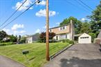 Welcome to this well-maintained home nestled in the heart of Yorktown Heights! This charming residence features a spacious eat-in kitchen, full bathroom, a formal dining room highlighted by beautiful wood beams, and a generous living room with a cozy fireplace and bay window, perfect for gathering with loved ones. Just off the main living space is a versatile bonus areaâ€”ideal for a home office, den, or playroom. Upstairs offers four comfortable bedrooms and a full bathroom, providing plenty of room for family and guests. The finished basement includes a wood-burning stove, creating a warm and inviting space for relaxing or entertaining year-round. Located just minutes from major highways, shopping centers, and local restaurants, this home effortlessly combines comfort, character, and convenience.