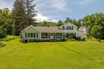 Historic Farmhouse on 87+ Acres with Ponds, Outbuildings & Endless Potential.Welcome to a rare opportunity to own a piece of Sullivan County history. Set on over 87 scenic acres, this charming 1830s farmhouse blends timeless character with exceptional space and natural beauty. With two serene ponds, a picturesque water wheel, and wide open fields, the property offers the perfect backdrop for peaceful living or a dream agricultural venture.The home features 4 bedrooms, 2.5 bathrooms, and more than 2, 400 square feet of living space. A standout feature is the stunning Great Room, added in 1974, boasting nearly 600 square feet with soaring beam ceilings, oversized windows, and a classic colonial fireplaceideal for gatherings or cozy evenings.This unique property also includes a two story, three car garage, a whimsical three-story chicken coop, and even a private pickleball court, blending country charm with fun and functionality. What could be better than all of this in the heart of the countryside? Whether you&rsquo;re envisioning a working farm, brewery, event space, or simply a private retreat, the possibilities here are vast.Donâ€™t miss the chance to make this one-of-a-kind property yours. Call today to schedule your private tour.