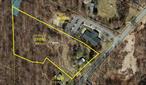Beautiful almost 5 acres with many possibilities. Possible commercial use. Includes a 3 bedroom home built in the 1800 on the property.