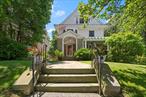 Welcome to 14 Ellsworth Avenue, a beautifully maintained and thoughtfully renovated side-hall Colonial, perfectly situated on a quiet, tree-lined street in the highly desirable Van Cortlandt Crest neighborhood of Yonkers. This expansive home offers the ideal balance of classic architectural charm and modern living, featuring 6/7 bedrooms and 3.5bathrooms across four levels of flexible space.As you enter, you&rsquo;re greeted by a welcoming foyer that opens into a sun-drenched, oversized living room accented by original hardwood floors and a cozy wood-burning fireplaceâ€”an ideal setting for both everyday living and entertaining. The formal dining room, complete with a second fireplace, flows seamlessly into a spacious, updated eat-in kitchen outfitted with stainless steel appliances, 2 sinks, 2 dishwashers, and 2 ovens, granite countertops, and abundant cabinet space. The second floor boasts 4 generously sized bedrooms and 2 full bathrooms, including a spacious primary suite with large closets and a tastefully renovated en-suite bathroom featuring a steam shower and soaking tub. On the third floor, you&rsquo;ll find a large additional bedroom or family room, a beautifully updated full bathroom, two more bedrooms, and ample storage space. The lower level provides additional living space that can easily serve as a home office, gym, playroom, along with extra storage and utility areas. Outside, enjoy a private backyard with a stone patio perfect for entertaining or relaxing, along with a large flat side yard that offers ample room. The property also includes a large two-car driveway. The home has been thoroughly & meticulously renovated and offers with 3 zone central air, radiant heat floors in some areas, updated kitchen, updated bathrooms throughout, and many more updates. Ideally located just minutes from shopping, dining, public transportation, and major highways, 14 Ellsworth Avenue offers suburban serenity with quick access to New York City. Donâ€™t miss this rare opportunity to own a truly special home.