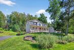 Crisp mountain air, pristine lakes, spacious pools, and numerous activities await you at Emerald Green in the Sullivan County Catskills. Welcome home to 20 Bristol Circle, a charming colonial situated on a serene and spacious lot. The house is move-in ready and offers central heating and air conditioning, three bedrooms, two and a half bathrooms, a finished basement, and a two-car garage. Enjoy your morning coffee on the covered front porch, on the massive back deck, or in the Zen garden in the backyard.Upon entering the foyer, you are greeted by double height ceilings and an airy interior. The first floor features a large, eat-in kitchen with ample cabinet space, an island breakfast bar, and a pantry closet. A slider in the kitchen leads to a massive deck which faces the woods, the perfect spot for grilling or entertaining. There is a formal dining room, a spacious living room with a propane fireplace, and a bonus den/family room that can be used as a home office or first floor guest room. This level has a half bathroom and coat closet in the foyer. The second floor has a spacious landing with a linen closet, a full bathroom with a bathtub, and three good-sized bedrooms. The primary bedroom is massive and offers cathedral ceilings, a walk-in closet, and an over-sized bathroom with a jacuzzi tub, walk-in shower, and double vanity. The finished basement offers another large and flexible space, which could be used as a playroom or home office, and it has a laundry area as well. The over-sized two-car garage can accommodate two large vehicles, as well as plenty of storage.Itâ€™s hard not to fall in love with the peaceful setting upon which the house is located. The front and rear yards are beautifully landscaped and offer plenty of space to enjoy. There are no houses behind this one, so the woods create a tranquil oasis with vibrant wildlife. There is a serene Zen garden in the backyard, a little slice of Catskill mountain paradise. The house is located right near the Entertanium, outdoor sports courts, dog run, and clubhouse. Emerald Green is Sullivan Countyâ€™s premier private community. It offers two brand new pools that are located at the lakeside sand beach. There are three lakes for boating (non-gas boats only) fishing, and swimming. Boat slips are available for rent. There are also communal playgrounds, basketball courts, tennis courts, pickleball courts, a dog run, and an indoor clubhouse with a gym. Emerald Green offers community events such as holiday celebrations, seasonal fireworks, childrenâ€™s activities, exercise classes, game nights, etc. It is the perfect way to experience the quiet of country living in a friendly and serene neighborhood setting. This property offers the benefits of municipal water and sewer, as well as road maintenance and snowplowing provided by the town. Rock Hill is the perfect place for a country getaway or full-time home. With its small-town charm, convenient shopping options and proximity to the city, this is the place to be in Sullivan County!