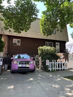 Two family corner propety in Ozone Park. First floor is a duplex apartment with living area, bedroom and half bath. Stairs connects to a 2nd floor with living area, full kitchen, full bathroom, two bedrooms and access to side yard. Third floor has a private entrance with livingroom, 2 bedrooms, kitchen and bathroom. Large side sideyard with accessibility from the duplex apartment and through the front of the home. One private driveway. Close to Resorts Casino, A Train and city buses, shopping and Belt Parkway and other major highways. Few minutes from John F. Kennedy Airport. Upgrades include roof, kitchen, heating system. A must see!