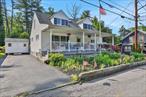 Sunny, spacious and so close to Uptown Kingston: This expanded Cape features four bedrooms and 2.5 baths, including a main-floor primary bedroom and bath, across more than 1, 900 square feet of living space on an oversized lot in one of Kingston&rsquo;s most sought-after neighborhoods. The home includes a large eat-in kitchen with plenty of space for cooking, dining, and gathering, with a graciously large adjacent living room that leads to a covered porch and a patio area with a lovingly landscaped fenced backyard, perfect for outdoor entertaining, relaxing with friends, or enjoying a quiet evening. The unique glacial rock formation in the backyard offers a natural focal point for a rock garden or landscaped retreat. Multiple driveways provide plenty of parking for guests or a multi-car household. The partially finished basement with a half bath also offers additional space or storage. Just minutes away, Kingston&rsquo;s historic Stockade district offers a lively mix of art galleries, boutique shops, charming restaurants, and a popular farmers&rsquo; market.