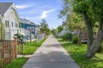 Welcome to your ideal Fire Island getaway at 17-18 Bungalow Walk, Ocean Beach, NY 11770. This beautifully renovated two-story A-frame residence offers the perfect blend of modern upgrades and timeless coastal charm. Ideally located just minutes from the Ocean Beach ferry and village shops, this four-bedroom, two-bathroom home provides both convenience and tranquility. Inside, youâ€™ll find an open floor plan featuring an eat-in kitchen with a dining bar, cedar walls, hardwood flooring, and a warm brick fireplace in the main living and dining areas. The first floor includes two spacious bedrooms and a full bathroom with a Euro-style open shower and radiant heated pebble floors. Upstairs, two large bedroomsâ€”each with its own private balconyâ€”share a stylish bathroom equipped with a whirlpool tub.This home is designed for easy beachside living, featuring a private in-ground pool, a spacious sun deck for entertaining, and a private outdoor showerâ€”perfect for rinsing off after a day at the beach. Comfort is ensured year-round with split unit air conditioning and heat systems throughout the home. Additional features include skylights, abundant natural light, and essential appliances such as a washer, dryer, dishwasher, and refrigerator. The property sits on a 50x80 lot (3, 920 sq ft) and offers approximately 1, 862 square feet of thoughtfully designed interior space.In addition to being a personal retreat, this Fire Island home is also a highly sought-after investment property, with a proven track record as a weekly rental. During peak season, it commands an approximate weekly rent roll of $9, 500 to $10, 500, making it an excellent income-generating asset for investors and second-home buyers alike.Ownership here comes with unique Fire Island privileges. Homeowners can apply for a boat slip through the Ocean Beach Marina, subject to a waitlist. Additionally, year-round residents may apply for limited vehicle access to the island via permitâ€”also managed through a waitlist systemâ€”offering an added level of accessibility and convenience.To find this exceptional home, take the Fire Island Ferry to Ocean Beach, walk right onto Bay Walk, then left on Bungalow Walkâ€”the house is the fifth on the right. Whether youâ€™re seeking a private beach retreat, a turn-key rental investment, or a long-term escape, 17-18 Bungalow Walk presents a rare opportunity in one of Fire Islandâ€™s most desirable communities.