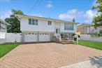 WELCOME HOME TO THIS BEAUTIFULLY RENOVATED & METICULOUSLY MAINTAINED FOUR BEDROOMS, TWO BATHROOMS WIDE LINE HI-RANCH WITH  PRIVATE PARK LIKE BACKYARD, 7 LOW TAXES!-THIS HOME IS LOCATED IN A DESIRABLE NEIGHBORHOOD WITH HIGHLY RATED OCEANSIDE SCHOOL DISTRICT -SET ON A QUIET, PICTURESQUE, TREE-LINED STREET. THE MOMENT YOU STEP INSIDE YOU WILL BE GREETED WITH LUSTROUS HARDWOOD FLOORS, AN OPEN AIRY FLOOR PLAN, A SUN DRENCHED LIVING ROOM WITH A BANK OF FLOOR TO CEILING WINDOWS FLOWS TO THE FORMAL DINING ROOM, A SLIDING GLASS DOOR OPENS ONTO A LARGE BALCONY TO ENJOY YOUR MORNING COFFEE WHICH OVERLOOKS THE SERENE BACKYARD GREAT FOR ENTERTAINING! THE UPDATED KITCHEN SHINES WITH GRANITE COUNTERS & STAINLESS STEEL APPLIANCES-3 BEDROOMS ON THIS FLOOR ALL WITH ELEGANT TRAY CEILINGS & A BEAUTIFUL UPDATED HALL BATHROOM- ON THE GROUND LEVEL THERE IS A HUGE SPACIOUS DEN WITH A BEAUTIFUL BATHROOM AND BEDROOM.  THERE IS A GARAGE ATTACHED AND OFF THE DEN THERE IS AN ENCLOSED PORCH TO PARTY OUT OF THE RAIN AND THEN ENJOY THE SUNSHINE IN YOUR HUGE YARD! TRULY A LUXURIOUS RETREAT! LOW TAXES +SO MUCH MORE! DO NOT MISS THIS MOVE IN READY GEM OF OCEANSIDE! FINALLY HOME SWEET HOME!
