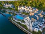 Introducing Canoe Place Boathouses, where Hamptons Home Ownership meets Luxury Hotel Service. Located just across the Shinnecock Canal from historic Canoe Place Inn, the Canoe Place Boathouses offer a rare blend of contemporary living, sought-after convenience, and celebrated Hamptons charm. All just a short drive from Manhattan-and just moments from three world renowned golf courses, beloved beaches and charming Hamptons Villages. Full service and designer-furnished by Benjamin Noriega-Ortiz, these 2- and 3-bedroom waterfront residences provide spacious interiors, private terraces, and panoramic canal views. With just 37 residences, these shingle-sided exteriors are inspired by the region&rsquo;s classic architecture and appointed with modern features like luxurious gourmet kitchens and cozy fireplaces. Thoughtfully designed to rejuvenate both body and spirit, these residences include graciously sized soaking tubs and private waterfront balconies. Each waterfront residence enjoys access to a residents only waterside pool & hot tub, fitness center, club lounge and dock. The Canoe Place Boathouses set a new standard in luxury lock-and-leave convenience in the Hamptons with all the resort concierge services at your disposal. Imagine being picked up right outside your door by a chartered yacht and whisked off to one of the many beautiful waterfront restaurants. Canoe Place Inn concierge can also set up a beautiful picnic lunch for a day at the beach. As a residence owner, enjoy priority access to Canoe Place Inn dining, spa services, and event spaces. Good Ground Tavern at Canoe Place offers a nostalgic atmosphere, blending the old- school charm of New England with modern sophistication. Plush seating, soft lighting, and elegant design details create a welcoming setting where guests can savor seasonal American cuisine, delivered with the signature excellence of Union Square Events, a Danny Meyer concept. As the site of America&rsquo;s oldest inn, Canoe Place has proudly welcomed travelers since 1697. Today, the resort&rsquo;s beautifully appointed private residences offer a rare combination of both rich history and an easier way to come home to the Hamptons. Unparalleled Access. Uncomplicated Ownership. The complete offering terms for the sale of membership interests in the homeowners association are in an offering plan available from the Sponsor. File No. H18-0004.