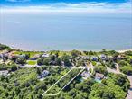 Welcome to one of the North Forkâ€™s most coveted private communities, Pebble Beach Farms of East Marion. This rare vacant lot offers a unique opportunity to build your dream home in a tranquil coastal setting surrounded by natural beauty, peace, and exclusivity. Set within a meticulously maintained neighborhood of luxury homes, this parcel promises the perfect balance of seclusion and convenience. Whether youâ€™re seeking a seasonal getaway or year-round retreat, this lot provides the canvas for a custom-built escape tailored to your lifestyle. The spacious lot is ideal for building a luxury residence with room for pool and outdoor living. Pebble Beach Farms offers exclusive access to its private beach, private tennis courts, basketball, bocce ball and pickle ball in its own community park. Also in close proximity is the beloved Kontokosta Vineyard, Islands End Golf Club and seconds from Greenport Village. East Marion is one of the North Forkâ€™s best-kept secrets offering privacy, charm, and easy access to everything you love about the Northfork. Whether youâ€™re a builder, investor, or future homeowner, this offering is a rare find in a tightly held, upscale coastal enclave. Build your legacy on the North Fork at 345 The Strand, East Marion.