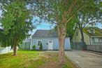 Completely Renovated 4 Bedroom Cape. Hardwood Tiled floors throughout, New Kitchen, New Bathroom, Great location, Close to Everything, Great Backyard.Must See!