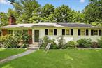 This marvelous house on a quiet cul-de-sac is an absolute gem! With a huge Office/Den and Recreation Room downstairs NOT included in the square footage, this house truly lives like a much larger home than many in this desired neighborhood. These extra spaces also will give any new owner tremendous flexibility to make the home THEIRS, with so many possibilities for comfort and convenience. On the main level, the updated Kitchen with stainless steel LG appliances has large Quartzite counter areas and plenty of stylish custom cabinets to cook and entertain to your hearts&rsquo; content! This level is SO light and bright with a nice flow throughout, and has access from the Dining Room out to a private, wonderful Deck for relaxing, grilling, or having guests. It is private with views, and is like being up in a huge treehouse! Back inside, hardwood floors are pristine and beautiful throughout this floor, and other amenities and details include custom crown molding, an oversized wood-burning fireplace, and large windows that give the space so much warmth. The Primary Bedroom is complemented by a full ensuite Bath, and the other two large Bedrooms and second Full Bathroom complete the main level. The Family Room downstairs is expansive - about 300 square feet - and has a door out to the back yard for your convenience...The 650 square foot Patio includes a barely used Hot Tub, beautiful landscaping, and additional areas to escape OR entertain! As far as the location, you will be walking or biking distance to shopping, restaurants, public transportation, and TWO wonderful play areas for children and pets - McCrum Field and Ryder Park! You really need to see this house and make it your home - it is TRULY WONDERFUL! STAR discount would bring taxes down to $15, 015.