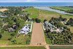 In the land of the big ground nuts also known as potato fields is an untouched 1.8-acre parcel cleared with 140&rsquo; of farm views to the north and Wainscott Pond to the south. This lot will accommodate a 6, 988 square foot residence with room for pool and pool house. Less than 1 mile to Beach Lane Ocean with a fantastic farm stand on the route.