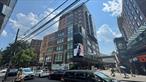 Located in the very heart of bustling downtown Flushing, this stunning and truly unique resale condo offers an unparalleled living experience, combining urban luxury with exceptional convenience. Just steps from the 7 subway line, LIRR, Hyatt Hotel, Tangram Mall, and a wide array of shops and restaurants, the location is unmatched. This spacious unit is drenched in natural light through large windows and features a generous living room with beautiful city views and elegant wood floors throughout. The open-concept, vented chefâ€™s kitchen is equipped with stainless steel appliances, granite countertops perfect for serious home cooks. The oversized primary bedroom includes a luxurious en-suite bathroom, while the second bedroom also features a large closet and additional storage in the living area ensures everything stays organized. Enjoy the convenience of an in-unit washer/dryer, and 24/7 security with a doorman and surveillance cameras. With low monthly maintenance and the benefit of tax abatement, plus optional indoor parking, this home offers both comfort and value in one of Queens&rsquo; most desirable locations.