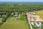 In the land of the big ground nuts also known as potato fields and behind the historic Wainscott Chapel is an untouched 1.73-acre parcel cleared with 175&rsquo; of north facing farm views. This lot will accommodate a 6, 236 square foot residence with room for pool and pool house. Less than 1 mile to Beach Lane Ocean with a fantastic farm stand on the route.