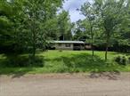 Location, location, location has never been more important when looking for a home and this property has it. Lake Muskoday is a gorgeous, non-motorboat lake just 10 minutes from downtown Roscoe, NY. The homeowners association maintains private access points, 250+ acres of hunting land, a brand new pavilion with pickleball & basketball courts, and more. On a quiet, town maintained road behind the lake sits a spacious lot with an inviting 3 bedroom country home. Utilities are in place with a drilled well, robust septic system, & electric service. The owners have taken care to protect, maintain, & refresh the property as needed with recent updates including an oil burner with above ground tank, new flooring, & new on-demand tankless hot water heater. A large pole barn roof is in place for storage and to handle ice & snow while a sturdy shed houses tools & equipment. Lake Muskoday is a Catskills hidden gem and this home is your chance for a quiet refuge in a friendly community.