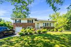 Welcome to this well-maintained 3-bedroom, 2-bath split-level home in the highly sought-after Herricks School District! Situated on a spacious 9, 450 sq ft corner lot, this south-facing property offers excellent natural sunlight throughout the day. Features include an updated 200-amp electrical service, a beautifully finished basement, a single-car garage with a double driveway, a fully fenced yard, a paver stone front stairway, and a sprinkler system. Great curb appeal and prime location close to shopping, parks, and transportation. Donâ€™t miss this rare opportunity in one of the best school districts on Long Island!