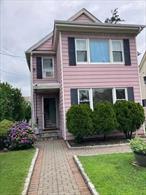 First Floor Apartment in a multifamily house located close to everything with one car parking. Hard wood floors.