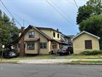 Wonderful investment opportunity in the heart of Nyack! Turn key at 8.6% CAP with potential upside! Completely renovated true multi family property consists of the main building with a one bedroom apartment and a studio on the first floor, and 3 bedrooms, kitchen and bath on the second floor. The second floor is a legal rooming house with active licence, currently rented as a 3 bedroom apartment. Full basement for ample tenant storage facility - rare find in downtown Nyack! The second building is a free standing studio apartment with its own storage shed. All tenants have parking on the property. All units have updated bathrooms and kitchens, newer windows and updated lighting. Fabulous cash flow, which can be further improved, should the new owner decide to operate the upstairs as a short term rental (legal according to the CO and active licence from RC Health Department).