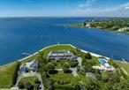 Introducing The Point, an exquisite waterfront estate situated on +/- 2 acres with +/- 380&rsquo; of frontage on Moriches Bay, a private dock and separate carriage house. Located on one of the most premier waterfront sites in the Hamptons, this brilliantly designed and executed custom home by architect Craig Arm and appointed by interior designer, Bunny Williams, features an 8 bedroom, 9.55 bath main house and 2 bed, 2 bath carriage house with the finest materials and details throughout. Ideal for entertaining on any scale - inside and out - this stunning house is complete inside with a state of the art dream kitchen, butlerâ€™s pantry, atrium, morning room, formal dining room, great room, study, and gym. Outside, enjoy this peninsula-like exclusivity in the multiple covered sitting areas, by the 50 x 24 gunite zero-edge pool with built in spa, and take in the beautiful panoramic views of both the sunrise and sunset. Additional features include geothermal heating and cooling and generator. With close proximity to Westhampton Country Club, the vibrant Main Street of Westhampton Beach for boutique shopping, casual and fine dining, Performing Arts Center, and Sunset Theatre, and Dune Road&rsquo;s world-class ocean beaches, this spectacular waterfront estate is not to be missed!