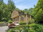 Tucked away on a quiet, wooded lane, this contemporary retreat is all about the setting - private, peaceful, and naturally dramatic. Set against a backdrop of exposed rock formations and mature trees, the backyard is a true sanctuary. Whether you&rsquo;re entertaining on the expansive deck, relaxing in the in-ground pool and jacuzzi, or enjoying a quiet morning coffee surrounded by nature, this outdoor space delivers. Inside, the homeâ€™s contemporary architecture shines. A two-story living room anchored by a striking floor-to-ceiling stone fireplace creates an open and airy focal point, flooded with natural light from skylights and oversized windows. The main floor flows with flexibility, offering space for everyday living and effortless entertaining. The primary suite includes its own bath and walk-in closet, while the finished lower level offers additional rooms for guests, work, or play. Located in the Katonah-Lewisboro School District â€” with Meadow Pond Elementary nearby â€” this home is also just minutes from some of the areaâ€™s best outdoor family destinations. Onatru Farm Park: Trails, sports fields, and open space host everything from everyday recreation to community events like the Fine Day Fair. Wolf Conservation Center: A unique wildlife preserve offering educational programs and family-friendly experiences year-round. Muscoot Farm (Katonah): A working farm with seasonal activities and animals, perfect for weekend family outings. Ridgefield Rail Trail: A scenic 2.3-mile walking and biking path just across the CT border. Enjoy everyday essentials and boutique shopping in South Salem and Ridgefield, CT, both a short drive away. For commuters, the location offers quick access to Route 35, I-684, and the Saw Mill Parkway, plus nearby Metro-North stations in Katonah or Ridgefield. If youâ€™ve been searching for peace, privacy, and an exceptional outdoor setting, this is it!