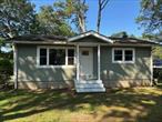 Spectacular Two Bedroom Ranch. Features include Renovated Hard Wood Floors Throughout.  Everything New: Windows; Baths; Siding; Granite Counters; Cabinets; Appliances; Doors,  Nothing Needed!Close to Schools, Shopping and Neighborhood Park!Low Taxes.