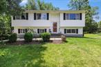 Tucked away on 1.5 peaceful, wooded acres in the heart of the sought-after Terbar Estate neighborhood. This beautifully maintained 3-bedroom, 2-bath home offers 1, 620 square feet of bright, comfortable living, just minutes from the vibrant Village, the SUNY New Paltz campus, and the iconic Shawangunk Ridge. Inside, the home features an open, flowing layout anchored by a thoughtfully designed maple kitchen with granite countertops and crown molding. Natural light fills the main living and dining areas, and French doors open onto a sun-drenched 12x15 three-season porch with slate floors, perfect for slow mornings, creative afternoons, or cozy evenings year-round.Downstairs, a fully finished lower level offers flexible space for your lifestyle. Whether you&rsquo;re gathering around the pellet stove for movie night, working from home in the bonus room, or using the extra space for guests or play, the possibilities are endless. A dedicated laundry area and one-car garage add convenience to everyday living. The home also features an incredible detached two-story garage. Step outside and you&rsquo;re in your own private pocket of nature. Mature trees and lush landscaping surround the home, while the deck, porch, and fire pit invite you to take in the fresh mountain air. Whether you&rsquo;re hosting under the stars or simply sipping coffee as the sun rises over the ridge, you&rsquo;ll feel deeply connected to the rhythms of Hudson Valley life.With world-class hiking and climbing at Minnewaska and Mohonk Preserve nearby, the Wallkill Valley Rail Trail moments away, and the local food, arts, and maker scene of New Paltz at your fingertips, this location offers the perfect balance of nature, culture, and community. And when the city calls, NYC is just a scenic 90-minute drive down the Thruway.Full-time home or weekend retreat, 25 Terbar Loop invites you to slow down, breathe deeper, and live fully, right here in the heart of the Hudson Valley.