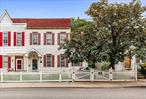 Lovingly maintained family home bursting with storybook charm and sprawling space. This classic home with red shuttersâ€”has belonged to the same family for decades and is just now coming to market. Situated on a generous 40?&#215;?100 lot in Maspeth, bordering Middle Village, this hard-to-find treasure has an expansive 2, 400?sf of living space thanks to a legal extension.Step inside to discover a large living room and an impressively oversized dining roomâ€”perfect for gatheringsâ€”plus a massive eat-in kitchen that leads out to a wood deck and private backyard. A large skylight in the entry stairway brings you upstairs to three bedrooms and two full baths. The primary bedroom boasts a private balcony and an enormous walk-in closet. And if you need more space, the second level is ample enough to configure into four bedrooms. The semi-finished basement offers flexible storage, garage access, and potential to be transformed into a recreation room. Thereâ€™s room to grow, create, and make it entirely your own.Quiet, tree-lined residential streets and a small-town vibe just minutes from shops, diners, bakeries, and long-standing mom-and-pop businesses. Easy commute with access via express buses (QM?24/24W), the M train in Middle Village, and major highways like the LIEâ€”making Manhattan a doable commute. Excellent schools: zoned for top-rated public schools including P.S.?153, I.S.?73 Frank Sansivieri, and Maspeth High School