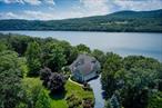 Welcome Home! Experience sweeping Hudson River views throughout this exceptional home, where breathtaking water vistas offer a truly unique living experience. The expansive great room welcomes you with soaring ceilings, fireplace and a wall of windows framing the picturesque and dynamic river. The chef&rsquo;s kitchen features elite appliances with a six-burner gas range, 2 sinks and a bright dining area overlooking the beautiful tidal estuary. Living is effortless thanks to the well-appointed and spacious primary suite located on the main level, complete with a stunning river view. The turret living room is special and invites you to stay awhile and enjoy. The formal dining room exhibits custom cabinetry and wall to ceiling windows.  The upper level showcases a unique loft with built-in bookcases, 3 generous bedrooms, attic storage space and a distinctive library featuring an ornate ceiling and bespoke cabinetry. The walkout finished basement offers a potential 5th bedroom, convenient kitchenette, full bathroom, large living room and private patio space. Outside, stroll around the charming property and admire beautiful plantings or simply relax on the oversized deck while taking in the lively nature of the river. Nestled in the heart of the Hudson Valley, a short walk to Rogers Point Boat Club, FDR and Vanderbilt Mansions, just 15 minutes to Amtrak and 3 miles to the celebrated Culinary Institute of America. Highlights include: 3 car garage, radiant heat flooring on main level, 2 zone heat/AC, Jacuzzi jetted tub and whole house Generac generator.