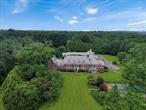 Welcome to GRAY HORSE FARM - Just Updated & Renovated for 2025 luxury living! Recently transformed with a gut-renovated Top of the line chef&rsquo;s kitchen with new cabinets, countertops, backsplash, floor, and high-end appliances. There are six new designer bathrooms, all-new recessed lighting throughout, upgraded 800-AMP electric and utility systems. This grand estate seamlessly blends timeless elegance with modern comforts. A truly iconic Georgian estate nestled in the heart of Upper Brookville, this 17, 587 square feet of total living space, this sprawling residence features 9 bedrooms, 9.555+ bathrooms, 10 wood-burning fireplaces, and exquisite architectural details, including vintage millwork, antique hand-painted wallpaper, and Samuel Yellin wrought-iron gates from the JP Morgan estate. Designed in 1924 by renowned architect James W. Oâ€™Connor and landscape architect Robert Ludlow Fowler, Gray Horse Farm is where classic architecture meets nearly 9 acres of pristine, equestrian-ready grounds. Perfectly suited for multigenerational living, the estate includes three separate guest/staff quarters (two 1-bedrooms and one 3-bedroom), offering privacy while staying connected. For those who love to entertain and enjoy the outdoors, the estate features a 20&rsquo; x 55&rsquo; heated saltwater pool with a pool house that&rsquo;s fully equipped, tennis and basketball courts, and a secret meditation garden you don&rsquo;t want to miss. For the car enthusiast there&rsquo;s a 7-car garage. Equestrian enthusiasts will appreciate the 3-stall stable, multiple paddocks, and run-in horse shed, all designed for top-tier country living. Additional highlights include a whole-house generator, â€”all just 27 miles from Manhattan. Whether you&rsquo;re seeking a premier equestrian retreat or an expansive generational compound, Gray Horse Farm delivers an unmatched lifestyle of luxury, privacy, and prestige. A rare offering close to top universities, marinas, beaches, golf, museums and americana shopping!