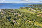 Discover a charming waterfront haven at 27 Jagger Lane in Westhampton! This cozy 1, 908 sq ft single story home offers 4 bedrooms, 2.5 bathrooms with an open floor plan situated on a sprawling 2.5 acre lot. With a generous 2600 sq ft footprint you can expand your living space to 5000 sq ft plus, giving you plenty of room to grow and customize.Enjoy direct water access, with future plans for a dock - ideal for those who love water adventures. The expansive lot provides endless possibilities for outdoor fun, pool, gardening or creating your personal sanctuary. This property is your gateway to Hampton living. Don&rsquo;t miss the chance to make it your own.