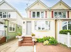 Welcome Home to this 3 Bedroom / 2.5 Bathroom Attached Home in Sunny Ozone Park. Highlights include: Gas Cooking & Heating, Stainless Steel GE Appliances, Porcelain Tile Throughout, Fully Fenced in Yard with 1 Car Detached Garage and Driveway, Partially Finished Basement and Much Much More,  Close to Resorts Casino, the A Train and city buses, shopping and Belt Parkway and other major highways. Few minutes from John F. Kennedy Airport. An Absolute Must See! Shed is a gift.