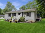 Charming, cozy and clean, you can move right in and live low-maintenance in this perfect home.The entire back end of the property abuts Butts Hollows Brook which runs year round and flows into Ten Mile River. Enjoy summers in the above ground pool with a beautiful brand new liner. Conveniently located 2 miles from Dover Plains train station. Shopping, schools and recreation are all nearby. This home is situated in a quiet and friendly neighborhood, schedule your showing today!