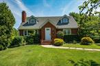 On one of the finest and most prestigious streets in all of Brightwaters and on a generous .4 acre property sits an updated and clean Cape Cod style home with unlimited potential! Large rooms, many important upgrades and a move in ready condition allow immediate occupancy, while the prominence of its neighborhood supports no limit to your imagination! This is your ticket in to a forever home address, with the convenience of being able to take your time to plan your next improvements. Complete with a detached 1 car garage, a tremendous square and level yard, an adorable covered back porch, a real wood burning fireplace and an expansive full basement, the next chapter of your life is waiting for you here!