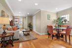 Welcome to the Century Condominium Complex in vibrant Kew Gardens! This gorgeous one-bedroom unit features hardwood floors, a private terrace, and an inviting open floor layout with natural light. The granite kitchen offers ample storage, stainless steel appliances, and a dishwasher. Enjoy great closet space and easily accessible laundry in the building. Just steps from Metropolitan Ave, Forest Park, and convenient transportation options, including LIRR and E&F trains. Pets are welcome!