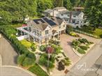 Tucked away in one of the North Shoreâ€™s most coveted enclaves, 50 Ships Point Lane presents an unparalleled opportunity to own a waterfront home with private mooring rights, resort-style outdoor living, and sweeping views of Oyster Bay Harbor â€” all just 30 miles from Manhattan.Set on an expansive, manicured lot with direct water access, this exquisite residence was designed for those who value privacy, elegance, and the effortless beauty of coastal living. Entertain against the backdrop of sparkling water views, host poolside summer gatherings, or unwind on your private deck as boats drift by.Inside, the home offers a generous, sun-filled layout with gracious living spaces and room for both formal entertaining and everyday comfort. High-end finishes, a chefâ€™s kitchen, and walls of windows ensure that the breathtaking harbor views remain front and center.Beyond the property, discover the unmatched charm of Oyster Bay Village, where boutique shops, local markets, and upscale culinary favorites like Gioia, Stellina, and 2 Spring create a lifestyle thatâ€™s as sophisticated as it is welcoming.A rare offering where luxury, convenience, and coastal tranquility converge â€” 50 Ships Point Lane is more than a home; itâ€™s a destination.
