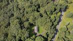 Tucked away on a quiet dead-end street in Central Valley, this rare 22.6-acre property offers an incredible opportunity just one hour from NYC. These owners have built the home in 1975; the land and home have been lovingly owned by the same familyâ€”and now it&rsquo;s ready for its next chapter. Whether you&rsquo;re dreaming of your own private retreat or seeking a unique investment opportunity, this stunning acreage is full of possibility. Bring your horses and use the property for trail rides, gather around a fire pit, ride your quads, add a pool, or simply enjoy the peace and tranquility of nature all around you. Builders and developersâ€”explore the potential to work with the Village on a subdivision in one of the best commuter locations in the region. The 4-bedroom home, built in 1975, is filled with natural light and features hardwood floors, a cozy fireplace in the family room, and a spacious deck overlooking the expansive yard. The walk-out basement remains unfinished, offering room to grow or create a custom space to suit your needs. Major improvements include a new septic system and leach fields installed in 2001, providing peace of mind for years to come. This is more than just a propertyâ€”itâ€™s a chance to create something truly special.