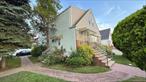 A 2-family residence situated in a tranquil neighborhood near JFK Airport is available for purchase. Conveniently located near several bus stops, including the Q111, which provides direct access to the Jamaica Center E Train Subway station. Additionally, the Q85, Q89, Q113, and Q114 bus stops are in close proximity. Commuting to JFK Airport is effortless. The property boasts 3-bedroom apartments on the first floor and 2-bedroom apartments on the second floor. The basement features a high ceiling and a separate side entrance. A nice backyard and 4 car parking spaces available. This property presents a superb investment opportunity with tremendous potential.