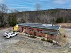 2316 Route 44 Salt Point is a 1, 980SF standalone building on 3.58ac along a commercial/residential corridor between Poughkeepsie and Millbrook, New York. Building features open floorplan with two restrooms, an office, storage and utility rooms, updated furnace with above-ground oil tanks, gravel parking lot and two driveways. Ideal for furniture/thrift shop, general storefront, farm stand, multi-family conversion, bed-n-breakfast, kennel/clinic, membership club or religious use.
