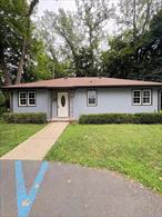Welcome to this well-kept 3-bedroom, 1-bath ranch-style home, offering the ease of one-level living on nearly a half-acre lot. Inside, youâ€™ll find a bright eat-in kitchen with ample cabinetry, stainless steel appliances, and tile flooring. The living room provides a cozy retreat, while ductless central air keeps the home comfortable year-round. All three bedrooms are conveniently on the main level, featuring updated flooring and generous closet space. The full bathroom is finished with neutral tile and modern fixtures. The home also includes energy-efficient spray foam insulation for lower utility costs. Step outside to a spacious, private backyard surrounded by mature trees â€” perfect for cookouts, entertaining, or simply enjoying a quiet evening. The property also offers off-street parking for added convenience. Located in the Village of Ellenville, close to local shops, restaurants, schools, and everyday amenities.