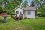 Cute as a button, updated, and move-in ready! Your search for an affordable, year-round lake house ends today! 11 Apache is a 2BR/1BA house located in the small, laid-back Indian Lake Community, which is centered around a 4-acre spring-fed lake. Currently set up as a weekend getaway & profitable Airbnb, the owners have made some valuable upgrades over the past few years including a new roof, spray foam insulation under the house, new water heater, new mini-split in the dining room, new heating units in the bedrooms, new flooring in the bathroom, recently painted interior, and freshly stained decks. The house has two bedrooms, one bathroom and two outdoor decks. It features a good-sized living room, eat-in kitchen, and spacious bedrooms. Set on 0.22 acres, there is plenty of space to relax outdoors. Gather around the firepit with friends or family or kick back in the hammock. After having fun at the lake, head to the outdoor shower and enjoy a BBQ in the backyard. There is a cozy shed with electricity that has been retrofitted for some backyard camping and star-gazing nights. The house can be sold fully furnished for a truly turn-key sale. Indian Lake is a friendly & relaxing community, the perfect home away from home. The modest annual dues cover lake maintenance, common area mowing & road snowplowing. The lake is perfect for catch-and release-fishing, swimming & boating. The community is located close to major Catskills attractions including Bethel Woods, Resorts World Casino, Kartrite Indoor Waterpark, and many golf course and outdoor activities.