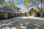 This house offers approximately 5, 900 square feet of living space with five bedrooms and four and a half bathrooms. The primary bedroom features ample space with a private en-suite bathroom, offering a serene retreat. The four additional bedrooms provide comfortable accommodations for guests or family members. The home boasts a well-appointed kitchen with high-end appliances, ample counter space, and a breakfast nook, making meal preparation a pleasure. The living room provides a cozy and inviting space to gather, while the separate dining area offers a formal setting for entertaining. The property also includes a versatile den or study, perfect for a home office or a quiet space for relaxation. Hardwood floors and large windows throughout the home allow for an abundance of natural light, creating a bright and airy atmosphere. The home&rsquo;s outdoor space includes a well-maintained yard, providing opportunities for outdoor activities or gardening. The attached garage offers convenient parking and additional storage space.