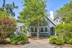 Tucked away in the heart of Seaview, this rare and charming 1930s beach home is steeped in history, character, and stories that only time can tell.With its exposed brick, original cabinetry, and handcrafted wood accents throughout, 37 Duneway is the kind of place that feels like a page out of a novel - nostalgic, grounded, and full of soul. Step into a massive living room with original hardwood floors, wood-burning fireplace, and cedar paneling, flooded with natural light from every angle. The kitchen has been lovingly updated with new appliances, a six-burner gas stove, and new windows, while still preserving the warmth and craftsmanship of the homeâ€™s original build. Formal dining feels timeless beneath the soft glow of a Japanese grasscloth-wrapped fixture, surrounded by vintage charm.The main level features a cozy bedroom with sliding doors out to the yard, and a half bathroom, renovated post-Sandy with thoughtful finishes.Upstairs, youâ€™ll find three additional bedrooms and two full baths - including a primary suite with French doors that open to a private sun deck. Every room is unique, and the massive hallway closets offer abundant storage for beach gear and beyond. Step outside to discover the ultimate Fire Island lifestyle: an outdoor living room with a built-in bar, outdoor shower, a lush yard ready for gatherings, and a guest house that invites multi-generational living, creative retreat space, or additional rental income.As a Seaview homeowner, youâ€™ll have access to the communityâ€™s private pool, tennis courts, and clubhouse - a hidden world just for locals. Whether you&rsquo;re ready to make this your personal summer sanctuary or join the islandâ€™s vibrant vacation rental scene, 37 Duneway is a rare chance to own a home with history, soul, and room to dream.