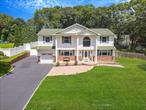 Majestic, Expanded Center Hall Colonial, 4 BR, 2.5 Baths on Usable 1/2 Acre Plus Property in North Smithtown; All Updated Windows Including Floor to Ceiling Andersens with Panoramic Views, Updated Siding (5 yrs), Roofing, Heating, Cesspool (10 Yrs); Newer Central AC (4 Yrs), Newer In Ground 16x32 Pool, Updated Appliances; Huge Primary Suite with 2 Walk-In Closets, Jacuzzi Tub and Separate Shower. Tax with Basic Star $18, 567.36.