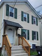 Duplex in the heart of Poughkeepsie on a quiet street. Unit 1 renovated in 2018 with stainless steel appliances. Unit 2 is newly renovated with new kitchen cabinets, quartz countertops, new bathroom, vynl flooring and carpet in the bedrooms. Property line goes down the middle of the shared driveway. The backyard could be used as private parking if needed. Unit 1 has direct access to backyard but access could be shared between both units. Walk out basement with additional access from first floor hallway. Basement could be used as storage or add washer/dryer. New furnace installed October 2023. First floor occupied (month to month); second floor is vacant. Great opportunity to live in one unit and earn rental income. Option to do mid-term rental for traveling nurses or student rental for various local colleges.