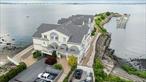 Welcome to Shelter Cove Estates, an exquisite waterfront gated condominium complex nestled in the heart of Throggsneck in the Bronx. This luxurious condo offers a unique blend of modern elegance and serene waterfront living, perfect for those seeking a sophisticated urban retreat.**Property Features:**- **Grand Entrance:** Step into the expansive lobby that sets the tone for the elegance and comfort that awaits you in your new home. - **Open Concept Living:** The unit boasts an open-concept design, seamlessly connecting the living, dining, and kitchen areas. The updated kitchen is a chef&rsquo;s dream, featuring stunning granite countertops and high-end stainless steel appliances. - **Elegant Interiors:** Experience the warmth and beauty of prefinished hardwood floors throughout the unit. The crown molding and recessed lighting add a touch of sophistication and style.- **Breathtaking Views:** Enjoy beautiful waterfront views from the living spaces and the guest room, providing a tranquil backdrop to your daily life. - **Luxurious Bedrooms:** The primary bedroom is a sanctuary, complete with a spacious walk-in closet. The guest room also offers a delightful water view, making it a perfect space for visitors or a home office. - **Spa-like Bathroom:** Indulge in the marble bathroom, designed to provide a relaxing and luxurious experience.- **Convenience at Your Fingertips:** The unit includes a washer and dryer, adding to the convenience and ease of living in this beautiful home.- **Exclusive Amenities:** This condo comes with its own boat slip, making it ideal for boating enthusiasts. Additionally, enjoy the convenience of two dedicated parking spots.- **Prime Location:** Shelter Cove Estates is strategically located with easy access to public transportation and major highways, ensuring that you&rsquo;re well-connected to the vibrant city life while enjoying the tranquility of waterfront living.This condo is more than just a home; it&rsquo;s a lifestyle. Don&rsquo;t miss the opportunity to make Shelter Cove Estates your new address. Schedule a viewing today and experience the epitome of luxurious waterfront living in the Bronx.