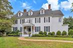 This Historic Center Hall Colonial, set on over an acre and a half on a quiet cul de sac is an oasis, with a private yard surrounded by protected woodlands. Centered between two quaint towns, it is close to the restaurants and shops in both Islip and East Islip, Brookwood Hall and the marinas. Quality craftsmanship and woodwork, including seven beautiful fireplaces adorn this spacious yet cozy home. Beautiful chef&rsquo;s kitchen including Wolf and Subzero appliances, marble countertops, cathedral ceiling and exposed brick opens up to a large deck and pool area. With a renovated 1500 sq ft barn/recreation building the possibilities are endless. Experience modern country living, convenient to all.