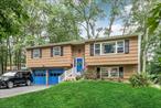 Welcome to 95 Hillside Avenue in beautiful Suffern, NY! This well-maintained 4-bedroom, 2.5-bath high ranch offers the perfect combination of space, comfort, and convenience. Upstairs, enjoy a light-filled living room, formal dining area, and an eat-in kitchenâ€”great for everyday living and entertaining. Hardwood floors throughout much of the upper level add warmth and character. The primary bedroom includes a private full bath, and two additional bedrooms share a full hallway bath. Downstairs features a large entertainment room, a fourth bedroom, and a half bath perfect for guests, a home office, or extended family living. Walkout access to the backyard makes this level even more versatile. Outside, youâ€™ll find a private backyard, new trex deck,  attached 2 car garage, and ample driveway parking. Located on a quiet street just minutes from schools, shops, restaurants, and public transportation, this home offers convenience without sacrificing tranquility.