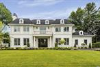 Located in the coveted Village of Flower Hill, this custom-built 6-bedroom, 4.5-bath Center Hall Colonial combines timeless elegance with modern luxury. Constructed in 2018, the home showcases exquisite craftsmanship throughout. A grand two-story entry foyer welcomes you into a thoughtfully designed layout featuring a formal living room, a cozy den with gas fireplace, and a state-of-the-art chefâ€™s kitchen equipped with top-of-the-line appliances. The main level also includes a formal dining room and a private guest suite. Upstairs, the luxurious primary suite offers a spa-inspired bath and a large walk-in closet with center island. Plus three additional spacious bedrooms and hallway bath. Additional highlights include: Heated garage, Radiant heated marble floors, legal walk-up basement with soaring 20â€™ ceilings in the playroom, 4-zone heating and central air, Whole-house generator, Room for a pool in the backyard. Munsey Park Elementary and Manhasset Secondary School district. Close proximity to Americana Manhasset Mall, Whole Foods, North Shore Hospital, and more.