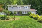 Welcome to this charming 3 bedroom, 1.5 bath home in a wonderful neighborhood in Yorktown Heights. From the moment you step inside, youâ€™ll love the bright and spacious living room with its airy high ceiling, skylights, cozy fireplace, hardwood floors, and recessed lighting. The open floor plan makes entertaining a breeze, and the versatile lower-level room offers plenty of options. Ideal as a media room, home office, or guest space. This home also features central air, natural gas heat, and public sewers for your comfort and convenience. Outside, the large fenced backyard offers privacy and space to enjoy the outdoors, perfect for relaxing, entertaining, or letting your pets play. An expanded driveway provides ample parking, and the shed offers extra storage. Conveniently located near the Taconic State Parkway for an easy commute to NYC via Metro-North. Full of potential and ready for its next chapter, this home is just waiting for you!